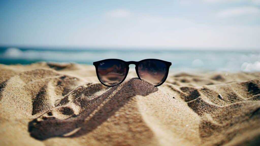 Stock photo sunglasses on sand